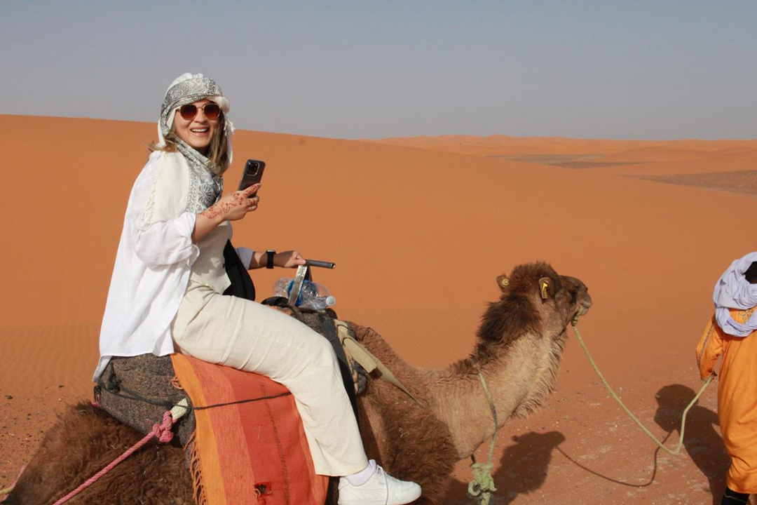 Experience a camel trek through the desert